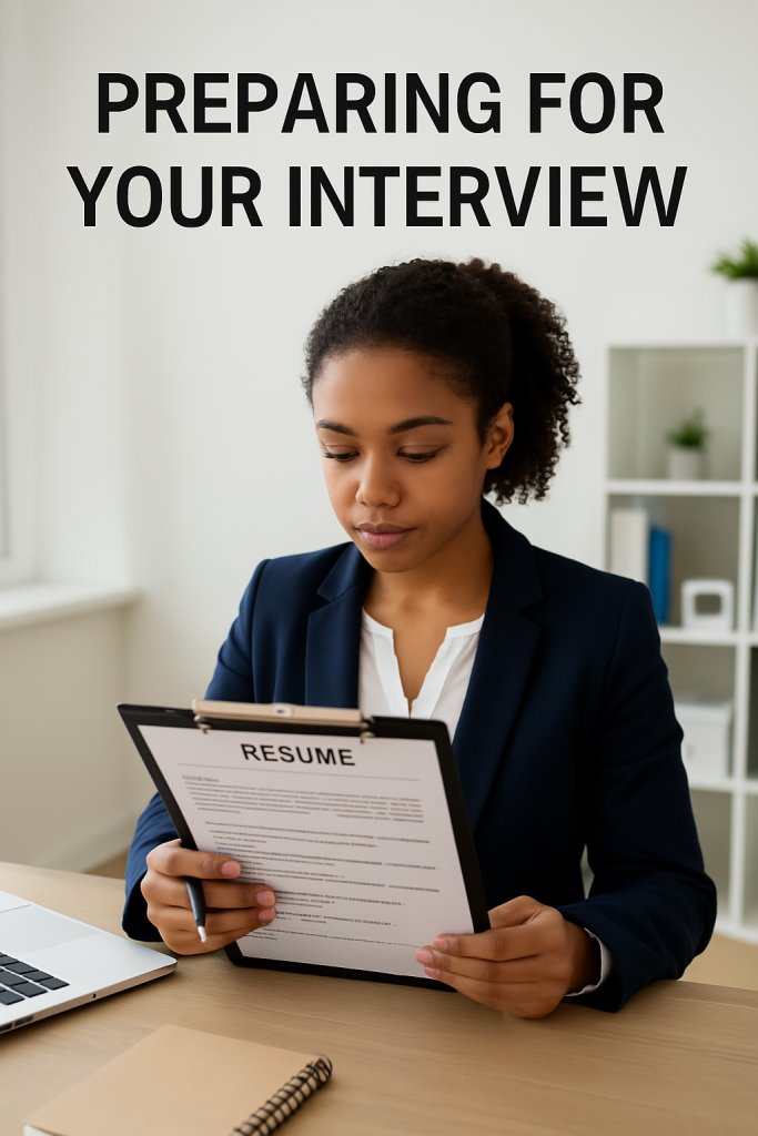 Young African American woman reviewing her resume in preparation for a job interview, showcasing professionalism and focus.